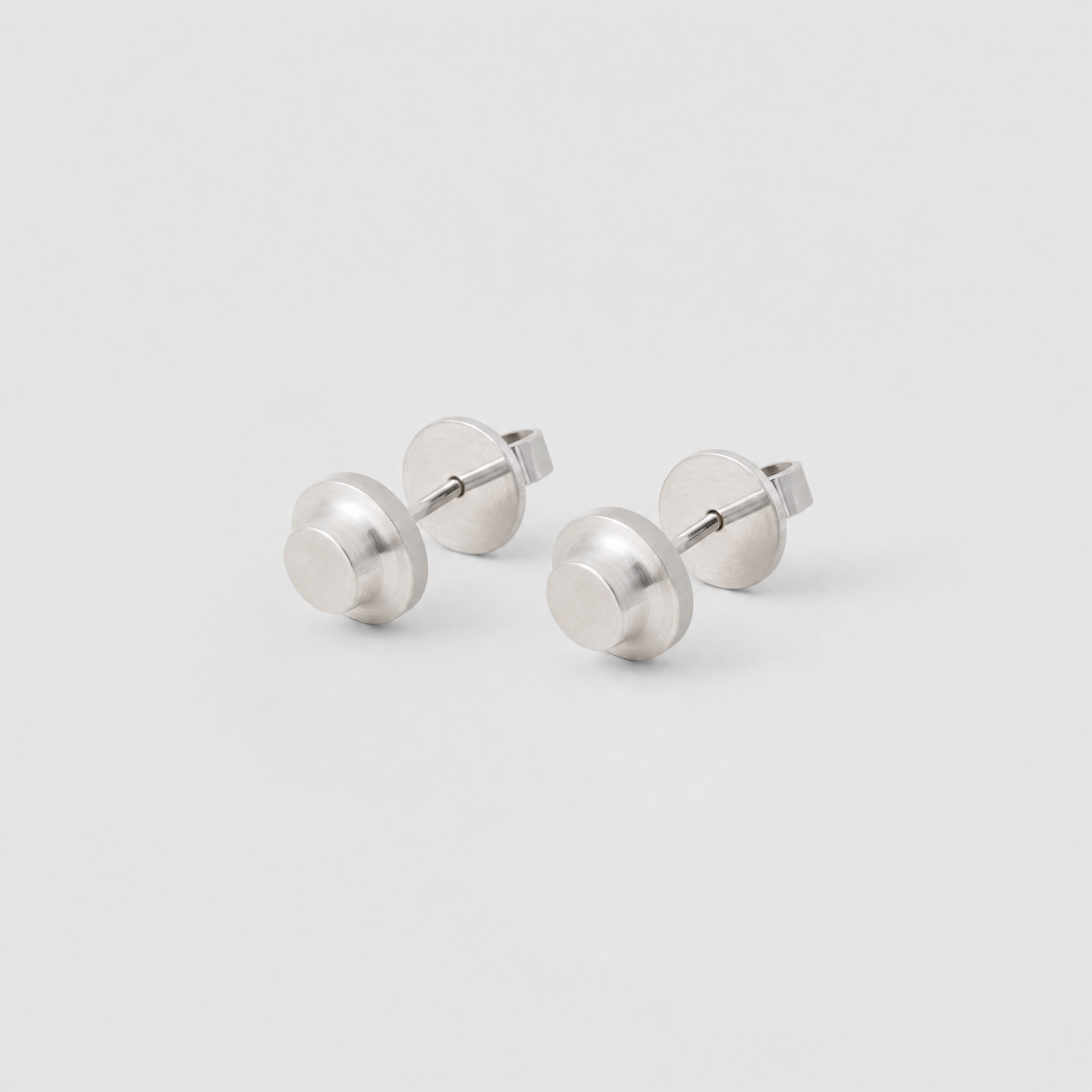 MODU MODU round-stud sterling silver earring pair, clinical white background