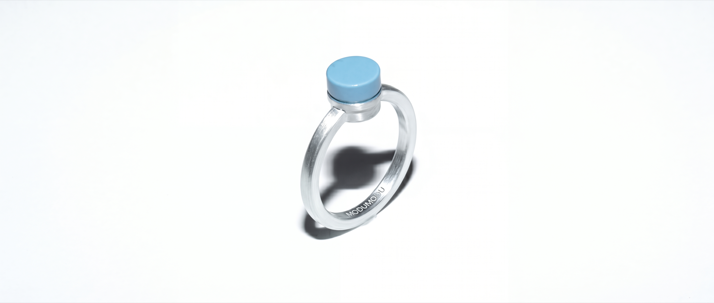 MODU MODU silver ring with pool blue stone face